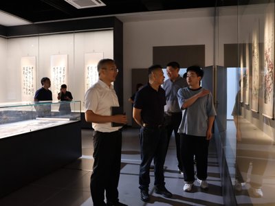 江苏广信感光新材料股份有限公司董事长李有明一行来校考察交流